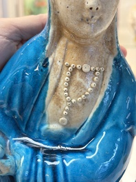 A Chinese turquoise-glazed Guanyin, a white-glazed bottle vase and a blue and white jar, 19th C.