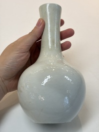 A Chinese turquoise-glazed Guanyin, a white-glazed bottle vase and a blue and white jar, 19th C.
