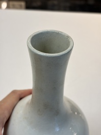 A Chinese turquoise-glazed Guanyin, a white-glazed bottle vase and a blue and white jar, 19th C.