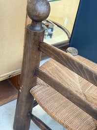 A pair of chairs in oak and straw, attributed to Charles Dudouyt, France, mid 20th C.