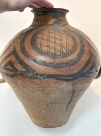 A Chinese painted pottery jar with geometric design, Neolithic period, Majiayao culture, 3rd millennium B.C.