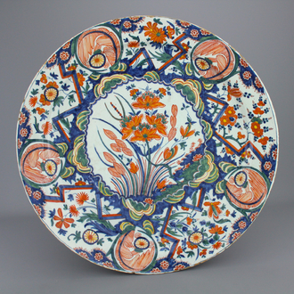 A massive Dutch Delft polychrome lightning charger, late 17th C., De Paeuw mark