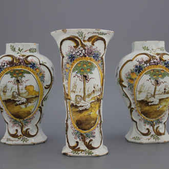 A 3-piece Dutch Delft polychrome garniture with orangist scenes of a lion resting below an orange tree, 18th C.