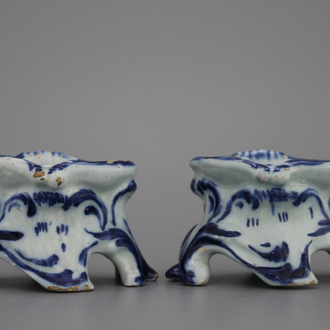 A pair of Dutch Delft rococo salts, 18th C.