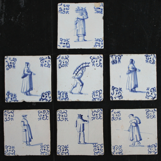 A set of 7 Dutch Delft blue and white tiles with various figures, 17th C.