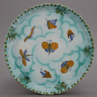 A Brussels faience butterfly plate, 18th C.