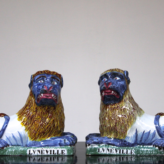 A massive pair of French faience Lunéville recumbent lions, ca. 1800