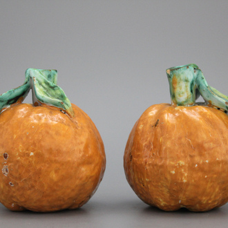 A pair of Brussels or Delft faience models of oranges, 18th C.