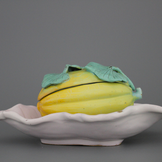 A Schrezheim faience tureen modelled as a melon on a fixed leaf, 18th C.
