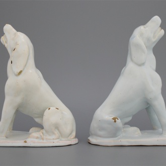 A pair of Brussels faience white figures of dogs, 18th C.