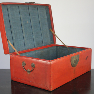 A Chinese red leather trunk, early 20th C.