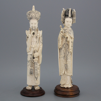 A pair of Chinese carved ivory figures of the emperor couple, first half 20th C.