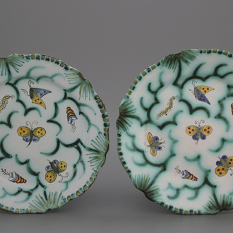 A pair of Brussels faience butterfly plates, 18th C.