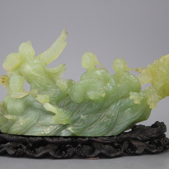 A Chinese carved jadeite group, Cultural Revolution, 20th C.