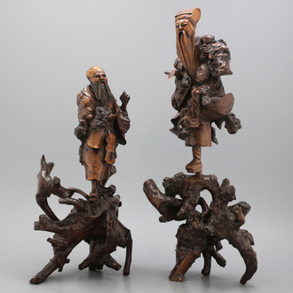 A pair of Chinese carved rootwood sculptures of immortals, 19th C. 