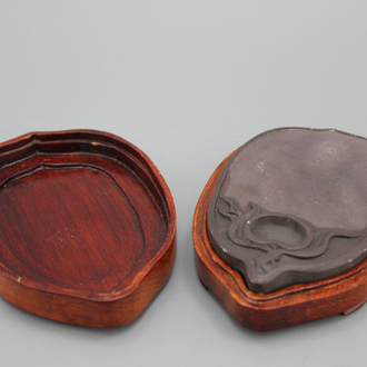 A Chinese carved duan ink stone in wooden box, 19/20th C.