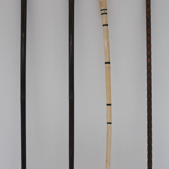 An ivory and ebony walking cane, rabbit and duck handle, 19th C.