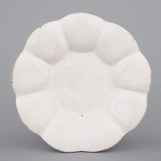 A white Delft lobed dish, 17th C.