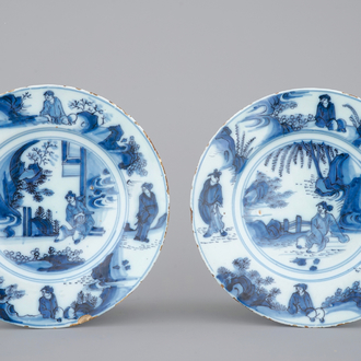 A set of 2 Dutch Delft blue and white chinoiserie plates, 17th C.