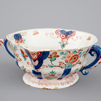 A rare Dutch Delft doré two-handled sauceboat, 18th C.