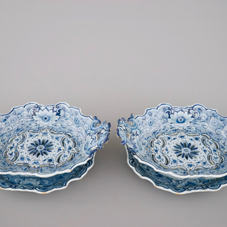 A pair of Dutch Delft blue and white strawberry strainers, 18th C.