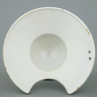 A white Delft shaving bowl, 18th C.