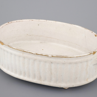An oval white Delft tureen, 18th C.