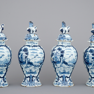 A set of 4 fine Dutch Delft blue and white vases with hunting scenes, 18th C.