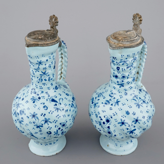 A pair of South-German pewter-mounted jugs with twisted handles, 17/18th C.