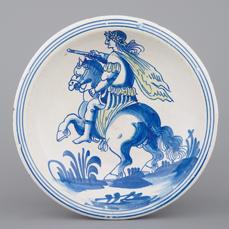 A superb Dutch maiolica dish with a Roman emperor on horseback, 17th C.