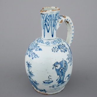 A Dutch Delft blue and white chinoiserie jug, 17th C.