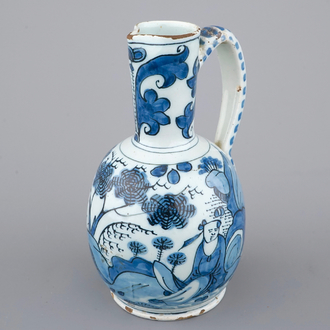 A Dutch Delft blue and white chinoiserie jug, 17th C.