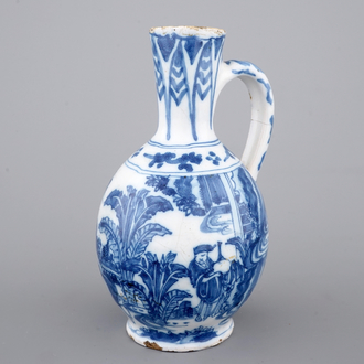 A Dutch Delft blue and white chinoiserie jug, 17th C.