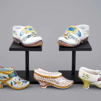 A small collection of French faience shoes, 18/19th C.