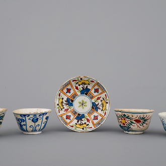 A set of 4 rare Dutch Delft tea cups and a saucer, 17/18th C.