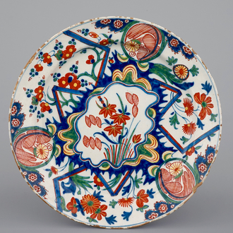 A polychrome Dutch Delft lightning plate, late 17th C.