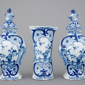 A blue and white Dutch Delft three-piece chinoiserie garniture, 19th C.