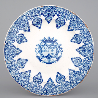 A massive French faience armorial dish, Rouen, 19th C.