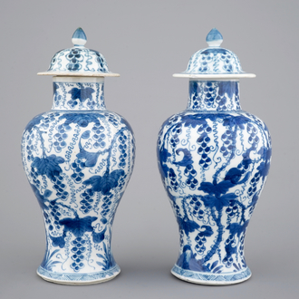A pair of blue and white vases and covers, Kangxi, ca. 1700