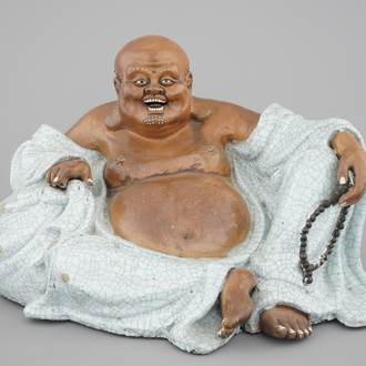 A massive Chinese signed Shiwan stoneware figure of a seated Buddha, 19/20th C.