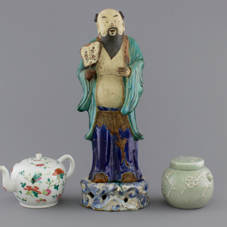 A Chinese sancai-glazed pottery figure, a famille rose teapot and a small ginger jar, 19th C.