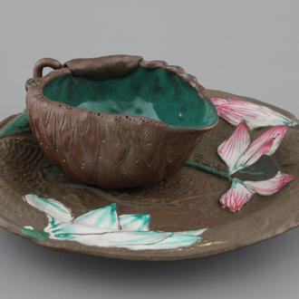 A Chinese enameled yixing stoneware cup and saucer, 19/20th C.