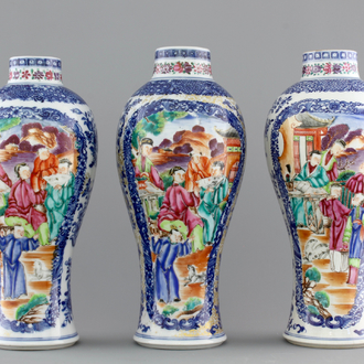 A garniture of three Chinese export porcelain Mandarin pattern vases, 18th C.