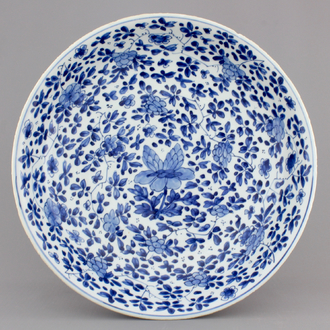 A blue and white Chinese porcelain dish with floral scrolls, Kangxi, ca. 1700