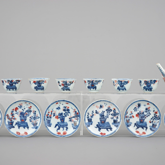 A collection of Chinese imari style cups and saucers with a teapot, and an export porcelain cream jug, 18th C.