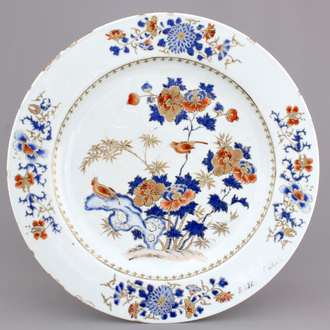 A large Chinese porcelain iron red, overglaze blue and gilt dish, 18th C.