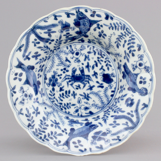 A blue and white Chinese export porcelain plate with crabs and fish, Kangxi, ca. 1700