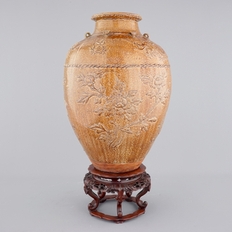 A large Martaban on a carved hardwood stand, 18/19th C.