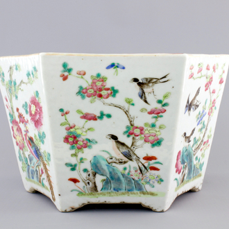 A Chinese hexagonal porcelain famille rose jardiniere with animals and flowers, 19th C.
