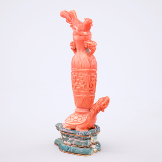 A Chinese carved red coral turtle snuff bottle on stand, 19th C.